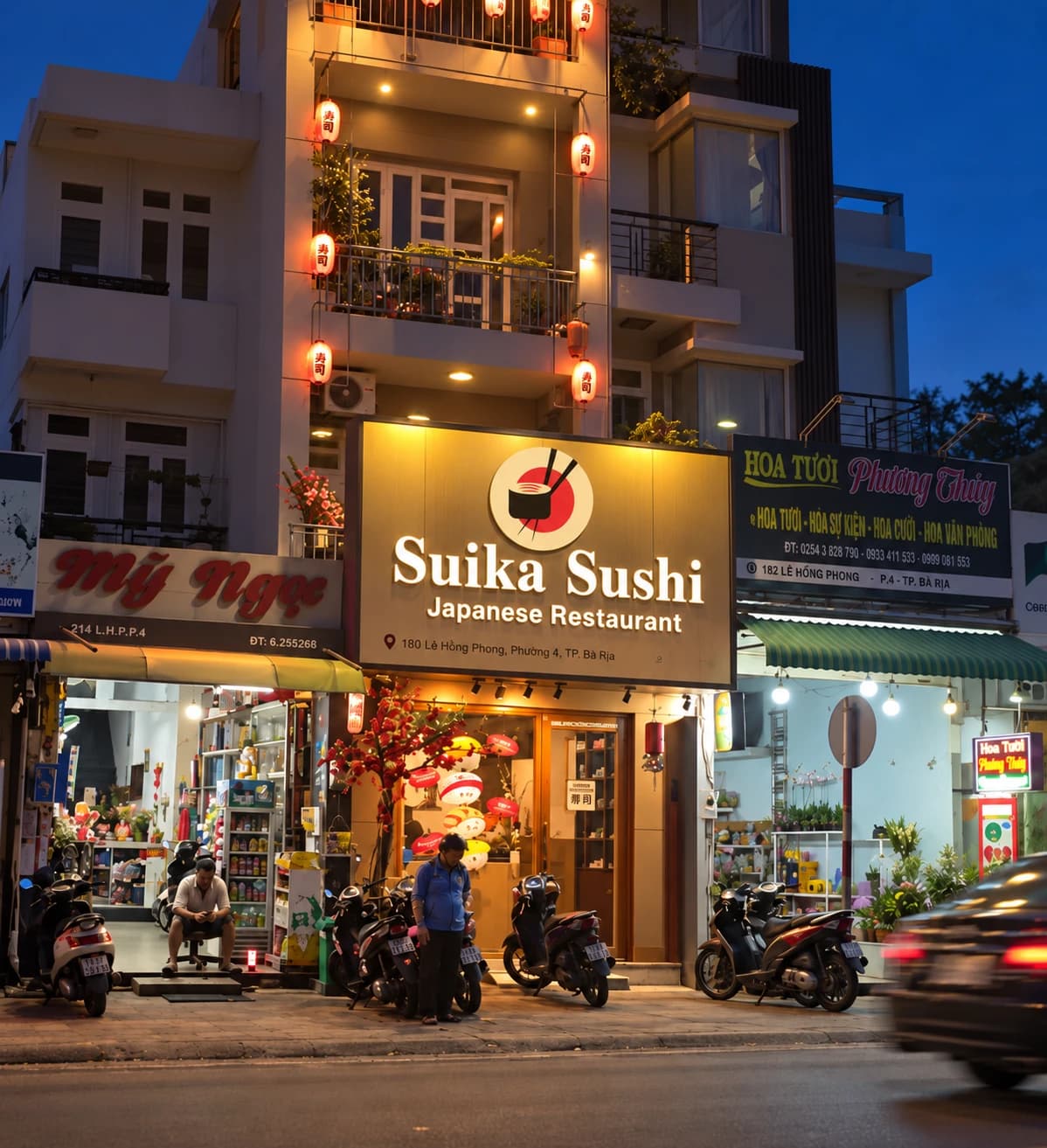 Hình mặt tiền Suika Sushi buổi tối do chủ quán cung cấp